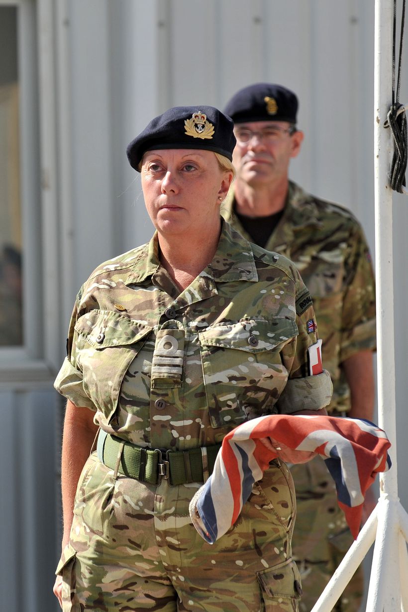 Carol stands proudly in her military uniform