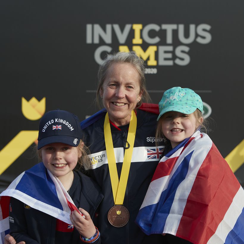 Sally Renard winning bronze with her two daughters