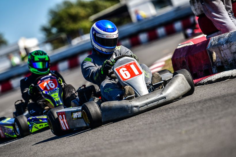Image shows Jamie Crease racing a kart