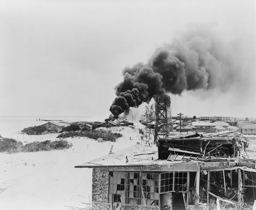 Smoke rising from oil tanks