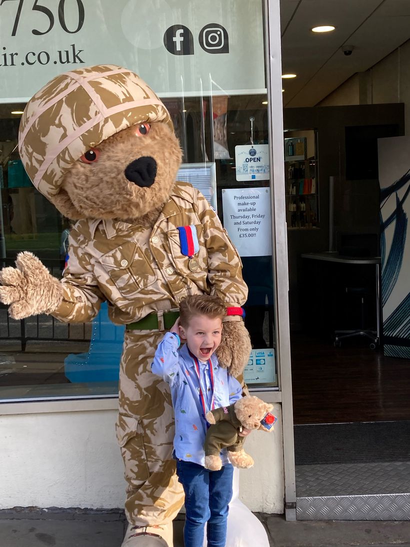 Oliver considers his new look with Hero Bear (courtesy Shaun Ro