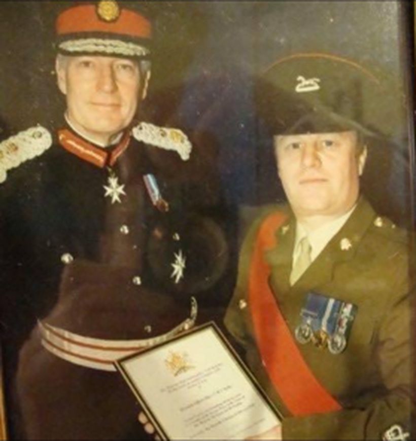 Mick receiving a the Lord Lieutenants certificate