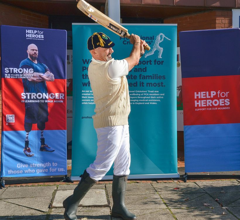 Man swinging cricket bat