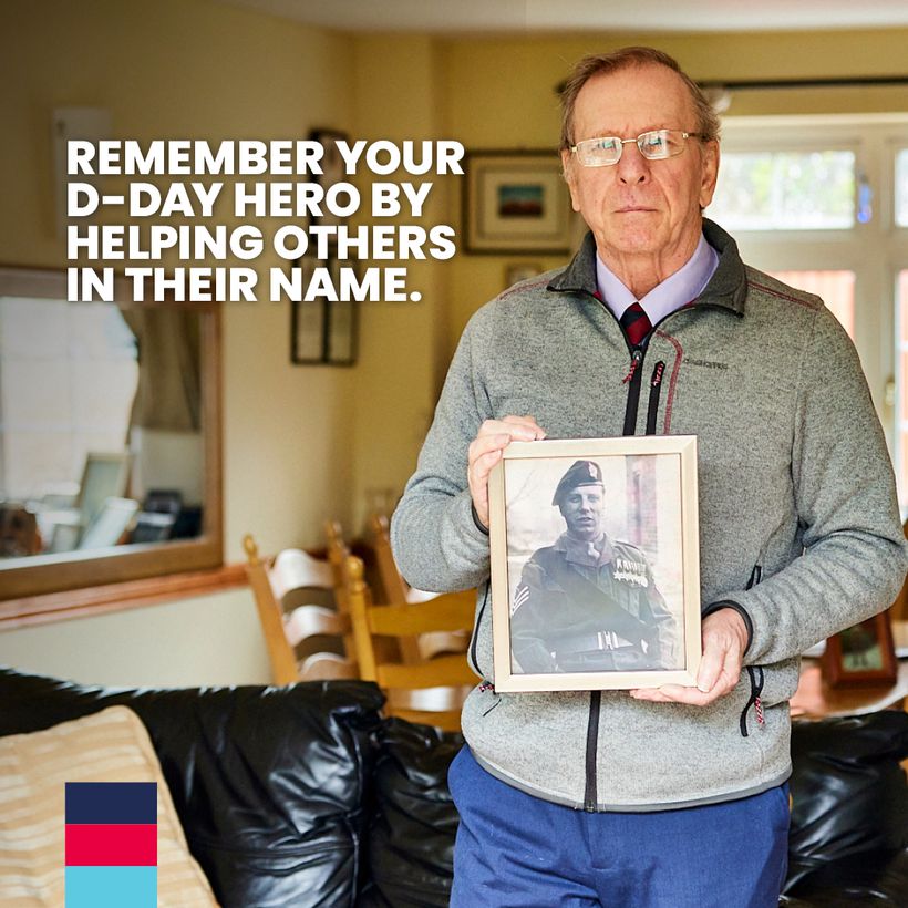 Bob Cubitt holding photo of his Dad