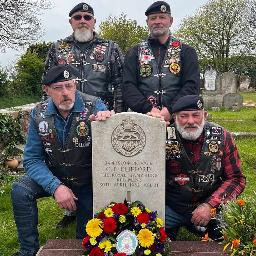 Four veterans at a graveside
