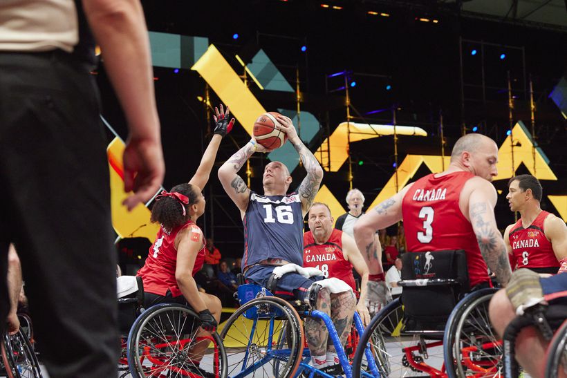Chris gets ready to throw the basket ball in the match