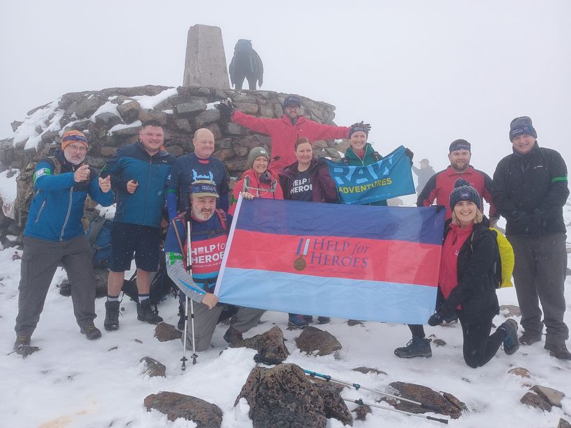 Image shows group of people at the top of Ben Nevis