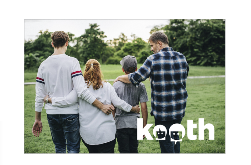 Male parent walking in fields with children