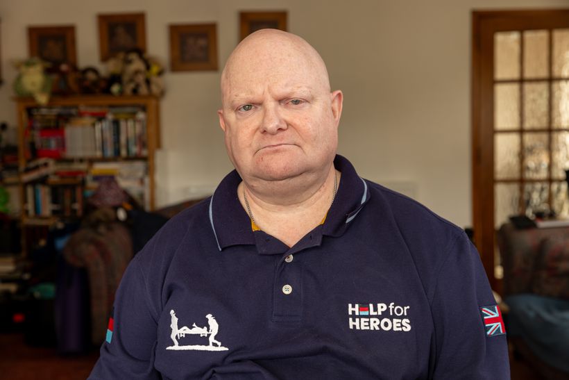 Shaun looks directly to camera