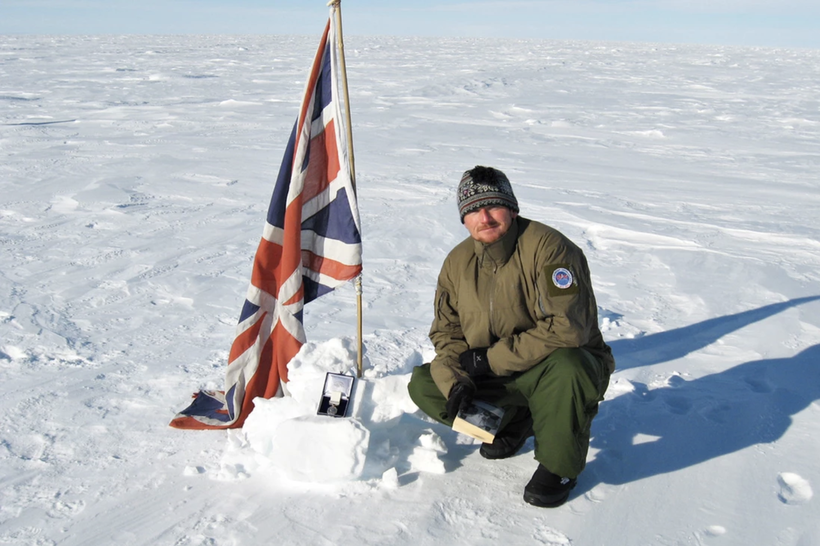 Explorer on icy landscape