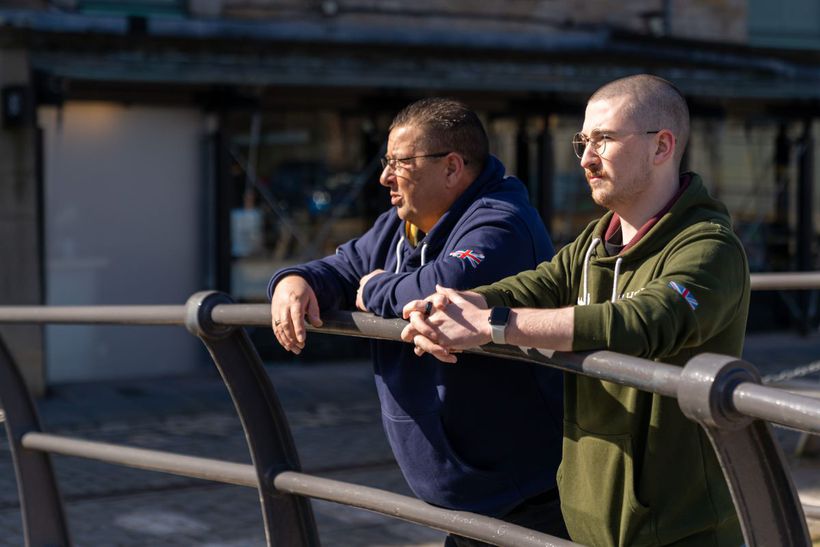 Brian and son Kieran stood at bridge