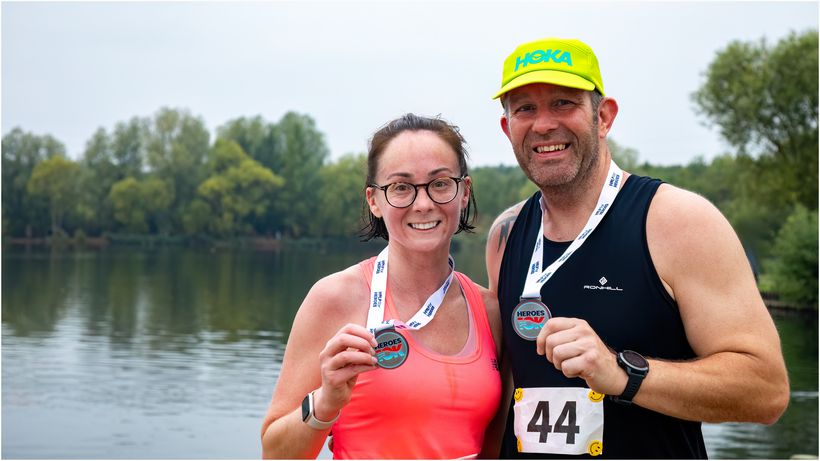 Runners with their Heroes 10K medals