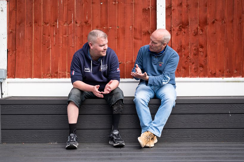 Fletch from Help for Heroes sits with veteran, Tony.