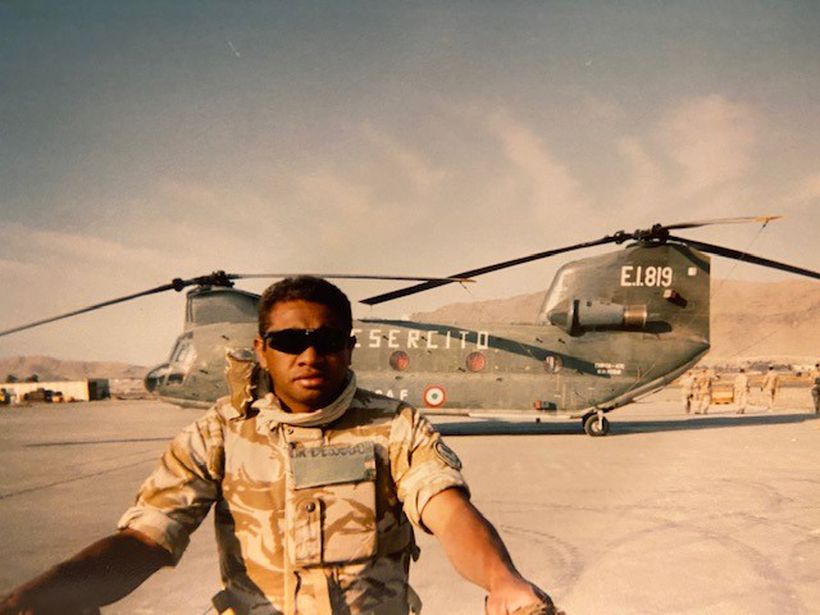 Derek in Helmand Province, Afghanistan in his military uniform