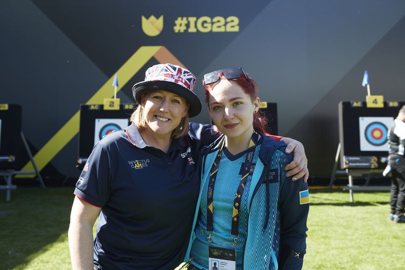 Sherry stands with a member of team ukraine at the invictus game
