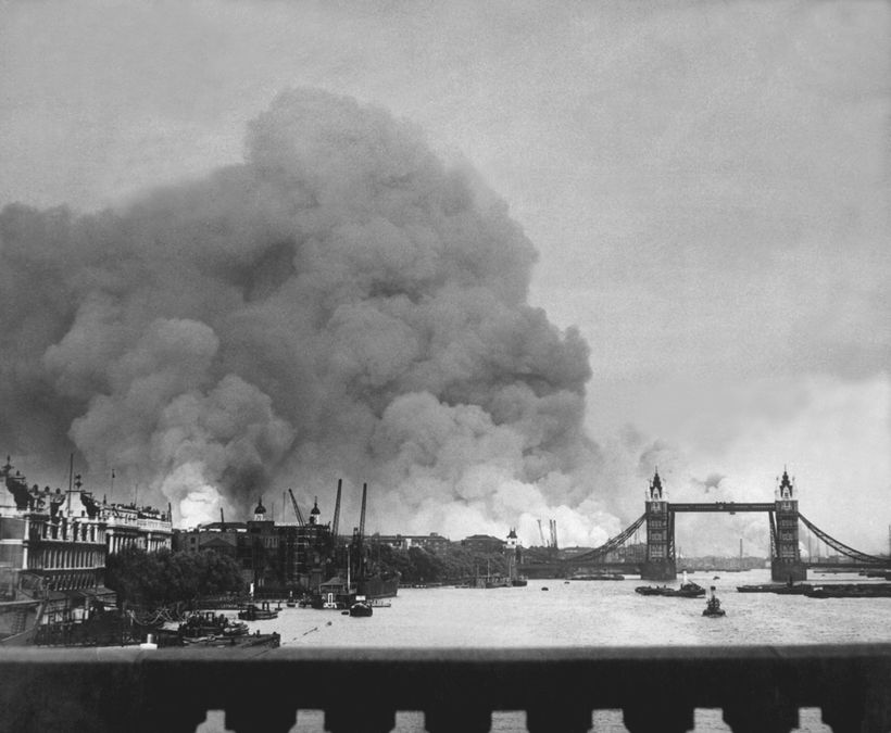 London Tower Bridge next to a cloud of smoke