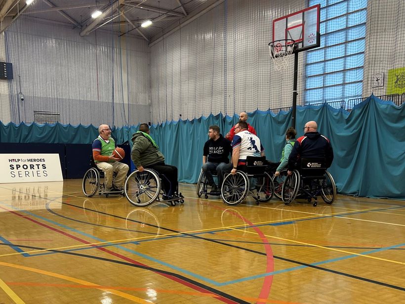 An image of Martin playing wheelchair basketball