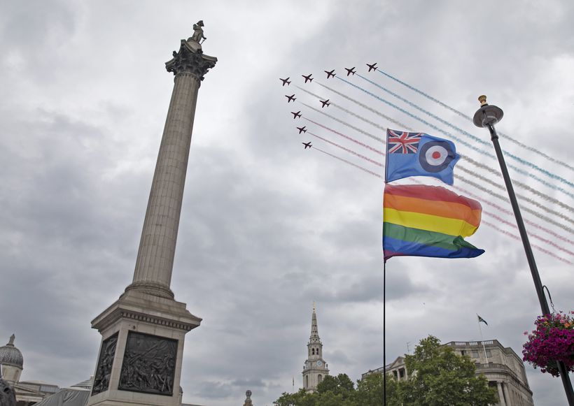 Red arrows flying over Nelson;'s column and LGBT+ flag