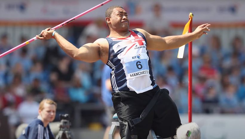 Derek competing in sport throwing a javelin