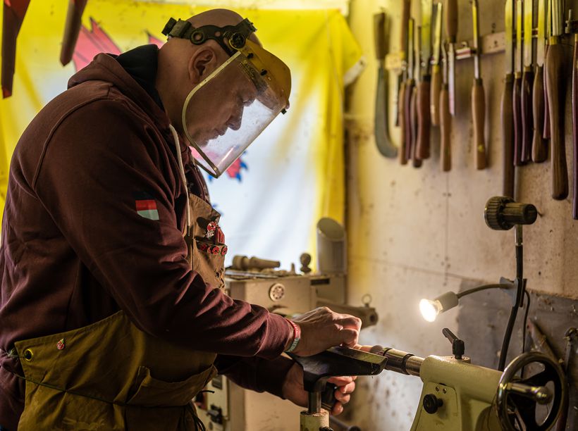 Greg working on a wood turning lathe