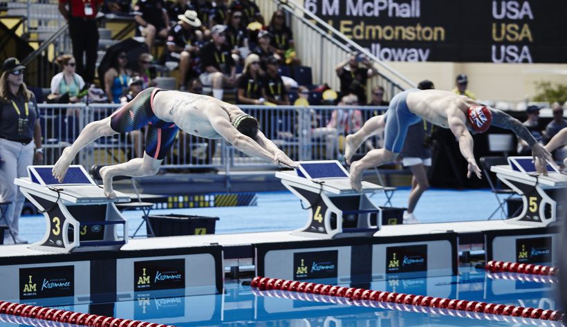 David dives off the board into the pool