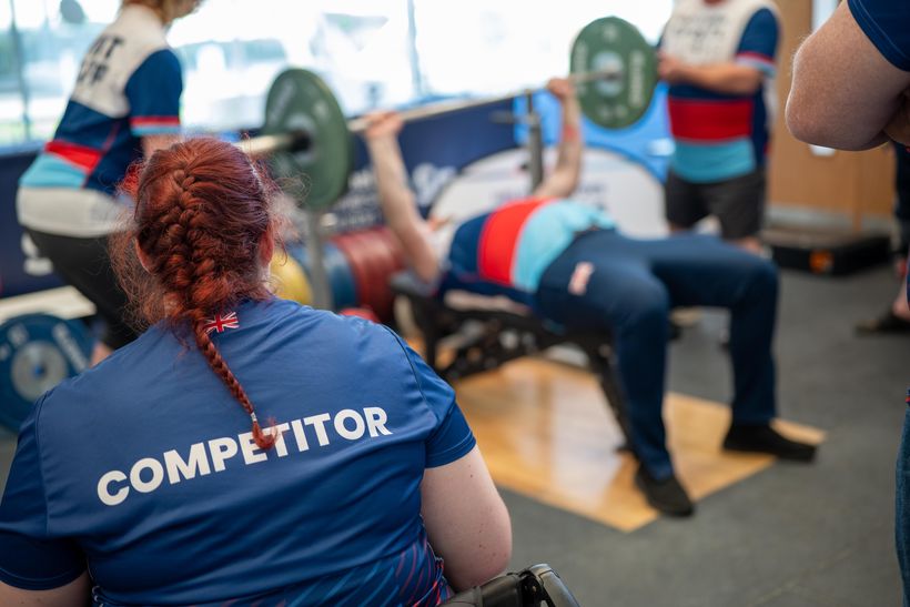 Photo shows a veterans taking part in a power-lifting session