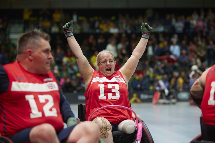 Lisa cheers as she plays wheelchair rugby at the invictus games