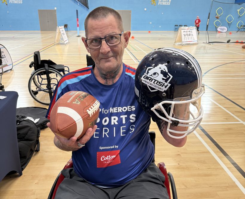 David Sproston is sat on an adapted wheelchair
