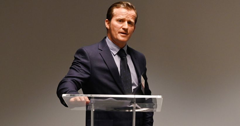 Paul Vicary speaking at a lectern