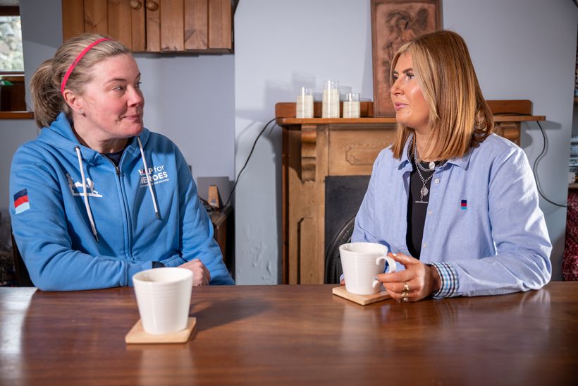 Vicki sits opposite Alisha having a chat and a cup of tea