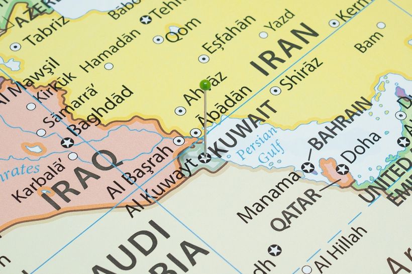 A map with a green pin in Kuwait