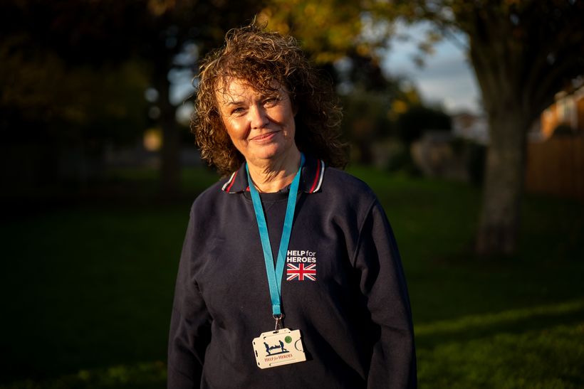 Image shows Karen wearing a dark blue Help for Heroes sweatshirt