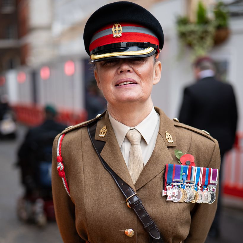 Karen wears her army uniform with medals